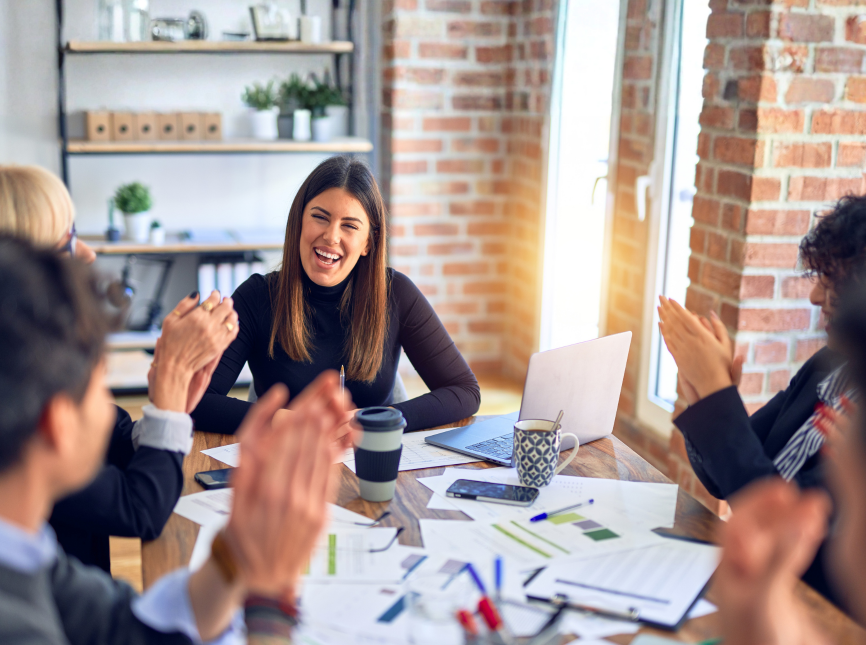 Smiling happy business office workers enjoying their work life